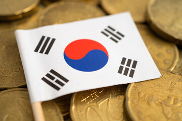 South Korea flag on gold coins, finance and banking business.