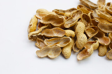 Peanut shells on white background.