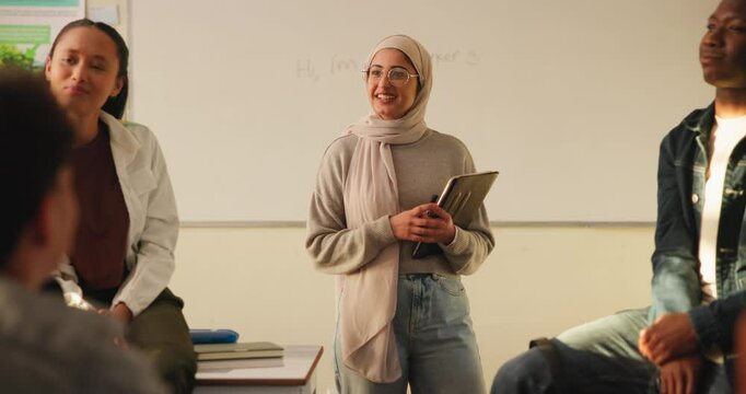 Conversation, class and professor with students at university for education, learning or knowledge. Talking, scholarship and muslim female lecturer in hijab with group of people in college for lesson