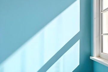 Fototapeta premium 햇빛이 들어오는 파랑 벽