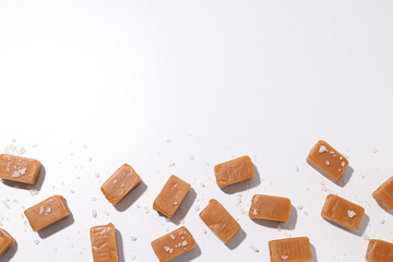 Cubes of salted caramel on a white background