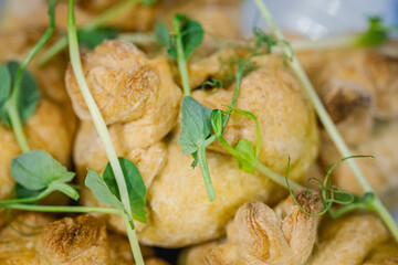 Culinary products decorated with fresh herbs