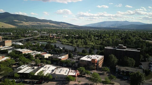 Missoula Montana aerial over Clark Fork River and downtown and mountains in summer