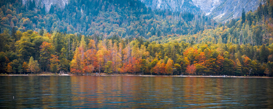 Panoramic view of scenic autumn landscape along Konigssee in Germany.