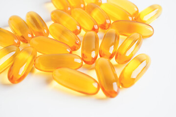 Fish oil or Cod liver oil gel in capsules with omega 3 vitamins, supplementary healthy food