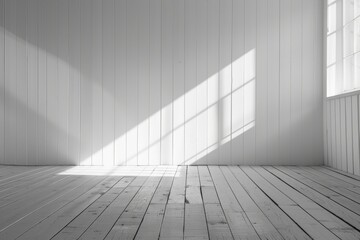 Obraz premium A simple and clean white room with a large window and wooden floor