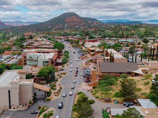Downtown Sedona surrounded by desert mountain range, Arizona, United States of America.