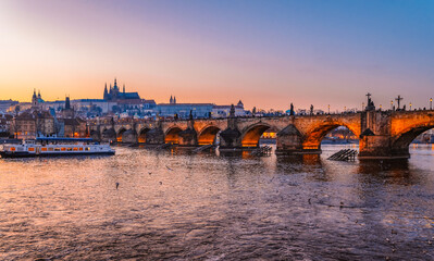 View of the city of Prague castle in hradcany and the Vltava river with Charles bridge in Prague, Czech Republic.