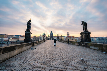 Obraz premium View of the city of Prague and the Vltava river with Old Town Bridge Tower on Charles bridge in Prague, Czech Republic.