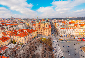 Obraz premium View of the city of Prague and old town square with buildings and Church of Our Lady before Tyn in the stare mesto from platform of Old Town Hall (Staromestska Radnice)