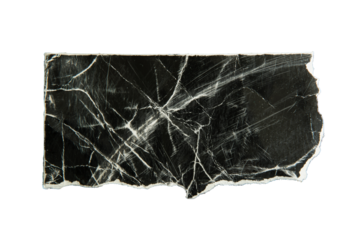 Torn distressed black paper