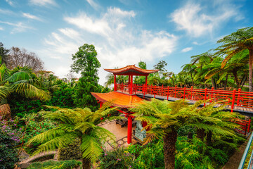 Fototapeta premium Monte Palace, Tropical Garden with Waterfalls, Lakes and traditional buildings above the city of Funchal