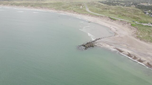 Tourists On The Ocean Of Klitmoller Cold Hawaii Summer Destination In Thisted, Denmark. Aerial Shot
