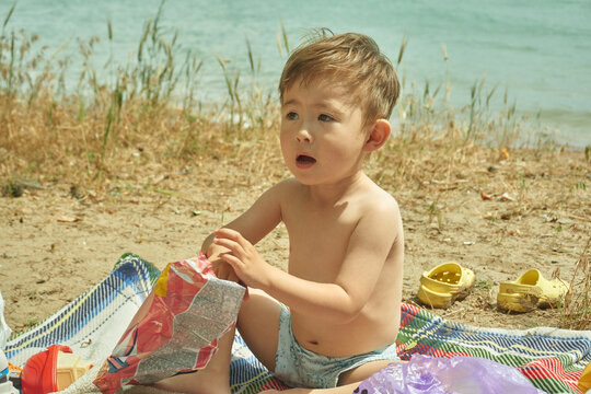Portrait of a boy relaxing on the sea
