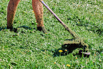 Greenskeeper uses weed whacker without protecting his skin with protective clothing.