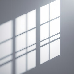 Shadow of the window on the white wall.