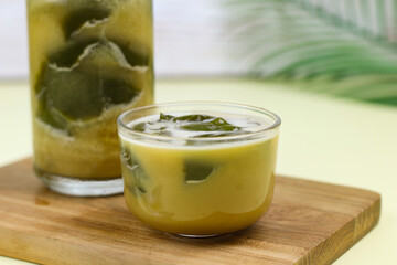 Es Cincau Hijau or green grass jelly,  Indonesian traditional drink made from grass jelly, coconut milk and palm sugar.  