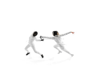 Fencing partners spar in controlled practice, each working to enhance their strategy and execution...