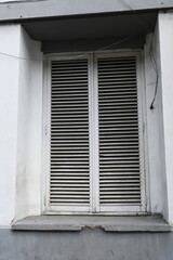old window with shutters