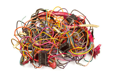 A lot of multi-colored wires. Tangled wiring on a white background. Old car wiring.