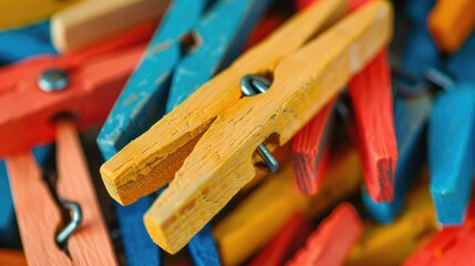 Obraz premium Vivid Wooden Clothespins Up Close as Texture and Background