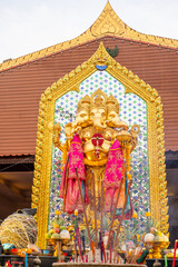The statue of Lord Ganesha is enshrined in a shrine where many people come to worship in Bang Yai, Nonthaburi, Thailand.