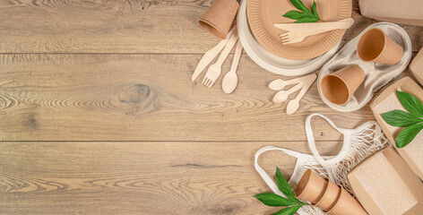 paper tableware and packaging, Eco friendly food containers from paper on a wooden background. top view. copy space