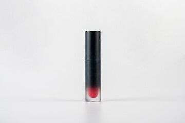 Close up of lip gloss on white background.