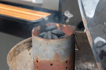 BBQ ignitor filled with coals