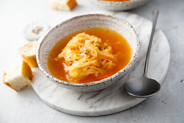 Homemade sauerkraut soup served with bread