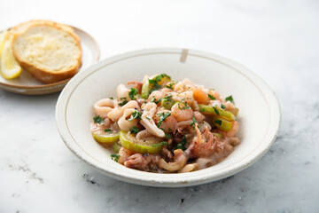 Healthy seafood ragout with courgette