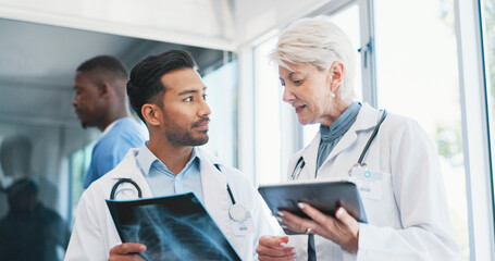 Doctors, x ray and medical analysis in clinic, professional consultation and teamwork collaboration...
