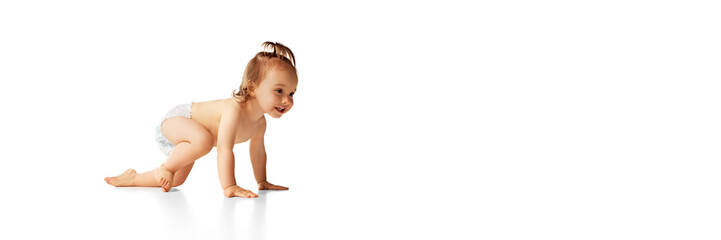 Obraz premium Happy, smiling baby girl in diaper moving, crawling isolated on white background. Active and healthy. Concept of childhood, care, health, infancy, lifestyle, motherhood. Banner. Copy space for ad