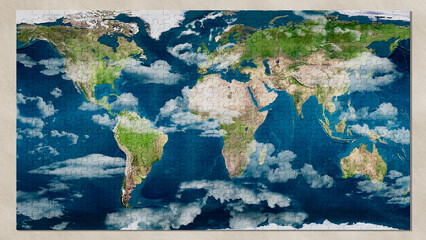 Illustrazione 3D. Elementi del Puzzle compongono la mappa del mondo. La cartina geografica piana del nostro pianeta si forma progressivamente fino al completamento..