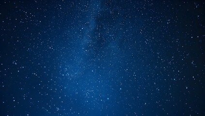 Fototapeta premium Starry sky at night, dark blue background, starry field, glowing stars, blurred stars in the lower left corner of the screen, minimalism, wide angle