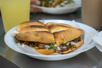 Delicious Mexican Torta de Carne de Pastor Sandwich on a Plate