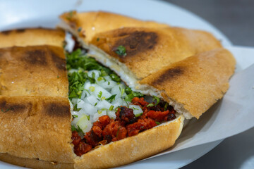 Traditional Torta de Carne de Pastor in Authentic Mexican Bread