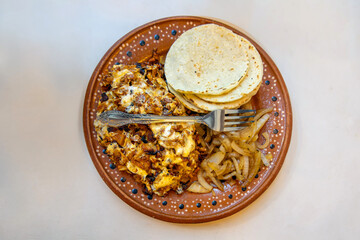 Authentic Mexican Alambre with Carne al Pastor and Tortillas on Ceramic Plate