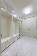 Home Entrance Hall. Interior. Wooden White Door, White Wardrobe. Minimalism. LED Light. Bright Carpet