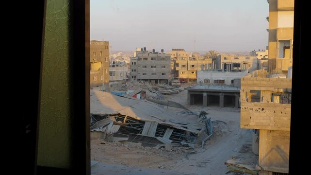 Remains of a recently bombed building, shops, schools and hospitals in war-torn Gaza
