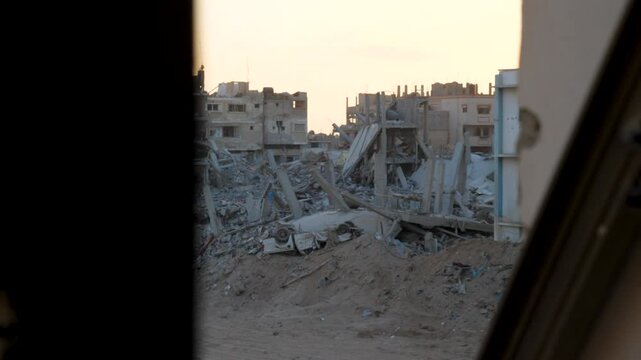 Palestinians home after Israeli bombardment of the Gaza Strip