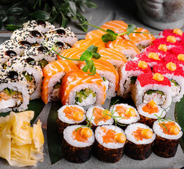 Assorted sushi platter on elegant table setting