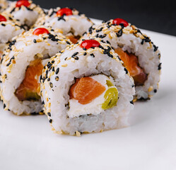 Fresh sushi roll platter on elegant white dish
