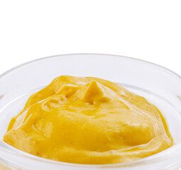 Bowl of creamy mustard sauce isolated on white