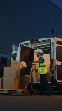 Vertical Screen. Logistics Warehouse Two Happy Friendly Laughing Workers use Hand Pallet Truck Start Loading Delivery Truck with Cardboard Boxes, Online Orders, Purchases, E-Commerce Goods