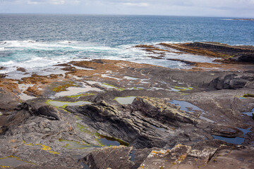 waves crashing on rocks
