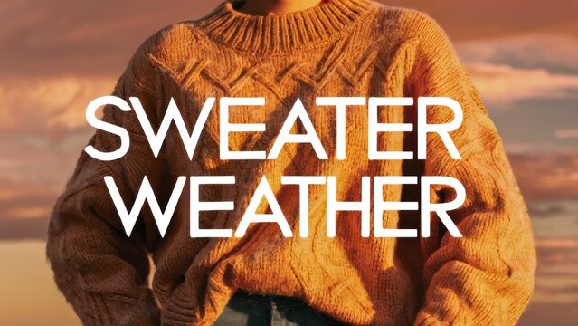 A woman in a sweater with the words sweater weather written on it, AI