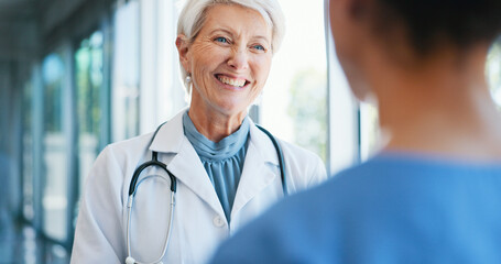 Woman, doctor and smile with discussion in hospital for healthcare internship, advice and planning....
