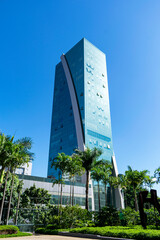 High-luxury building, modern and with a beautiful colorful look. Cloudless blue sky. Space for advertising. Vertical.