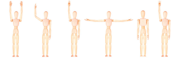 Assortment of wooden mannequins in different stances, isolated on white backdrop